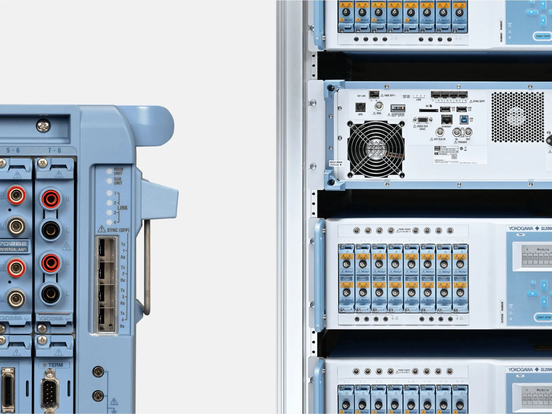 Stack of Yokogawa electronic data acquisition units mounted in a metal equipment rack, alongside a detached unit showing input ports, sync connectors, and handles.