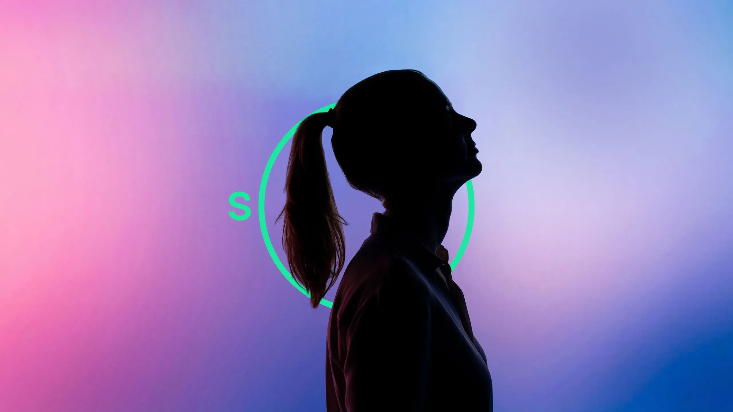 Silhouette of a person with a ponytail in profile against a pink-to-blue gradient, with a green circle outline and the letter S.