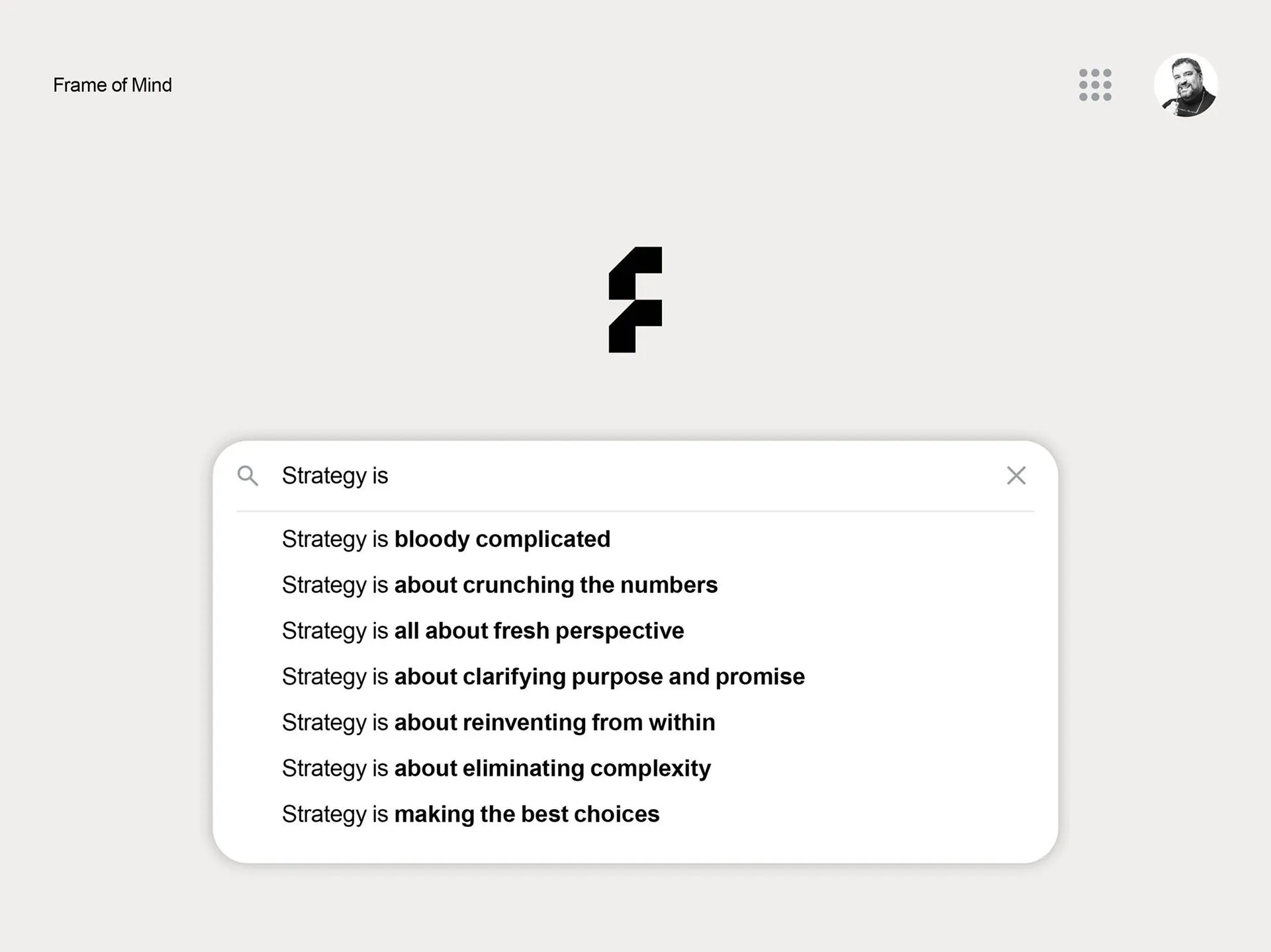 A webpage mockup for Frame of Mind featuring a central stylized letter F logo and a search bar with the query "Strategy is" displaying a list of autocomplete definitions.